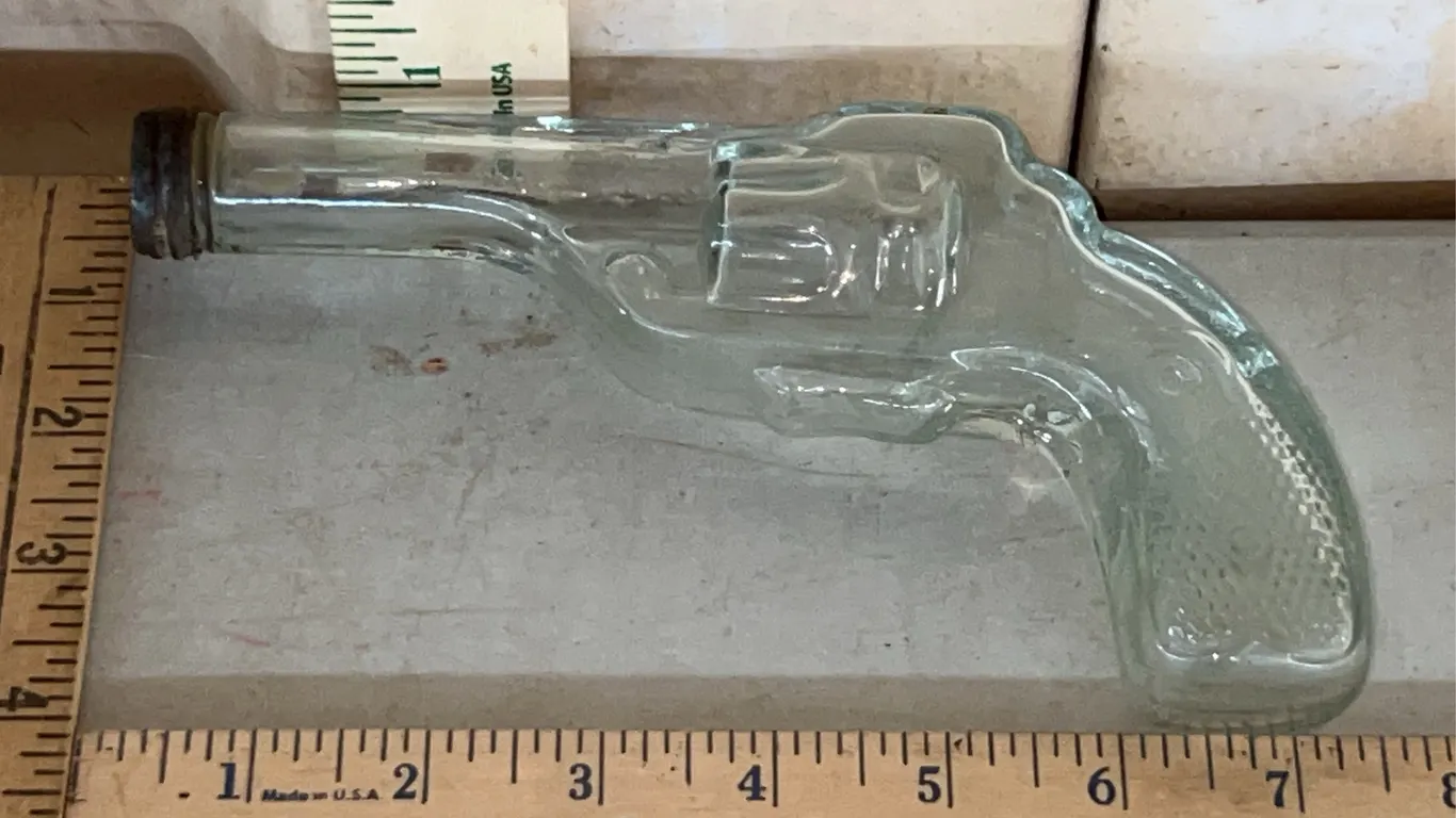 Vintage/Antique Clear Glass Revolver Candy Bottle Marked U.S.A. Avor 3.25 oz