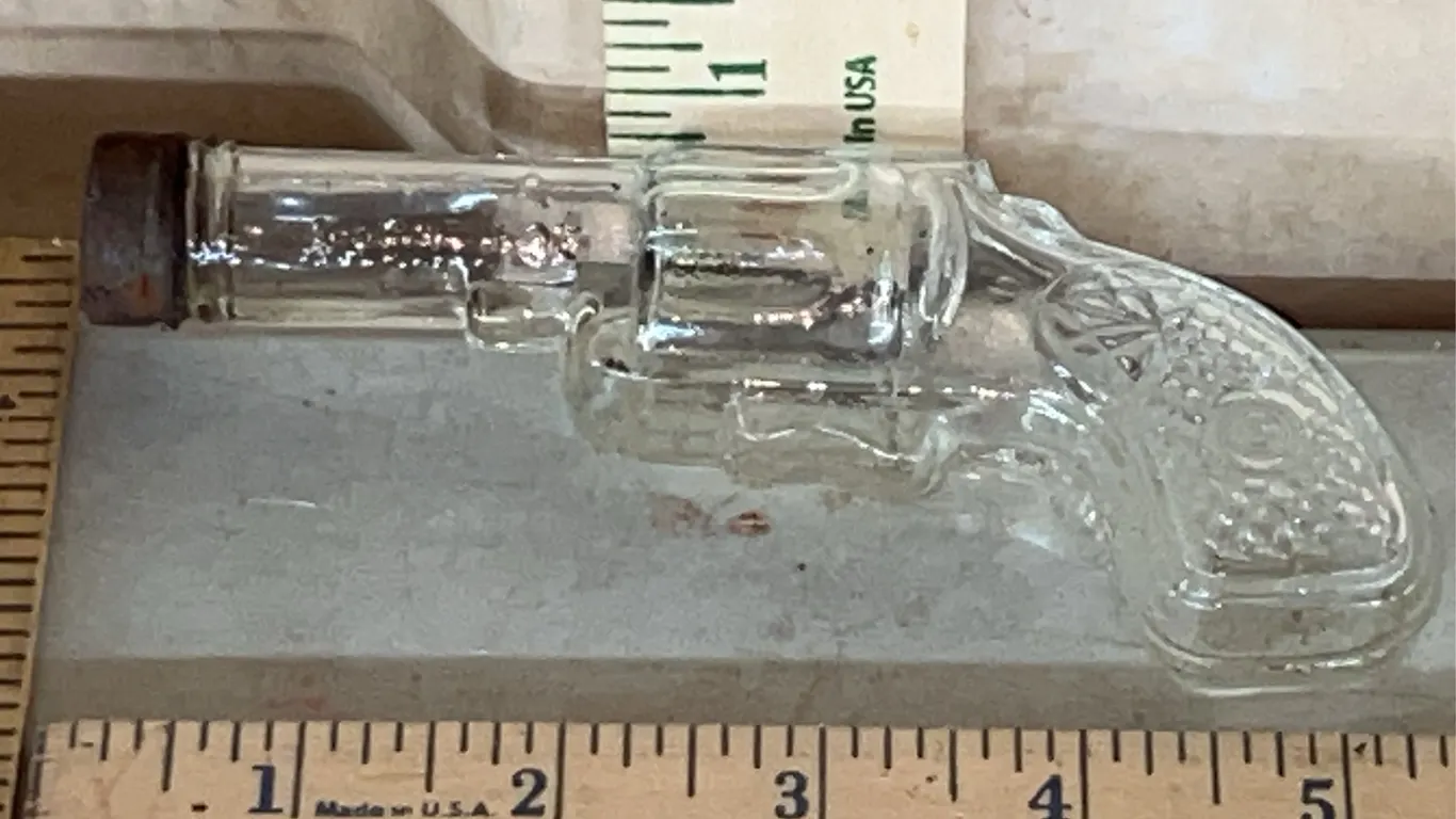 Vintage/Antique Clear Glass Revolver Candy Bottle Marked U.S.A. Avor 1 oz