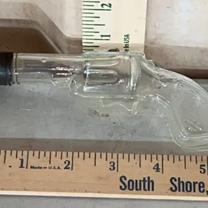 Vintage/Antique Clear Glass Revolver Candy Bottle Marked U.S.A. Avor 1 oz