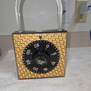 Vintage padlock shaped coin bank