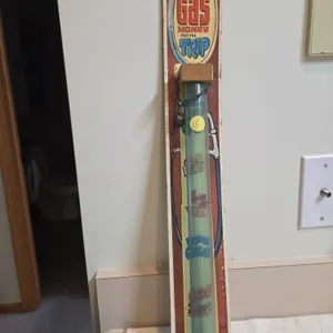 Vintage novelty coinbank, featuring a gas money for the trip gas pump theme.