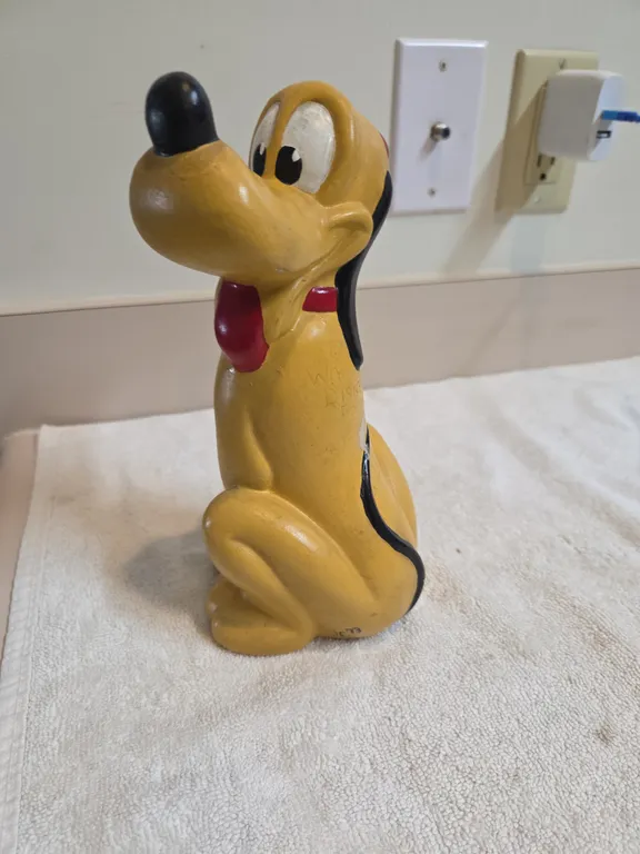 Vintage hand painted ceramic or chalkware Pluto. Figurine, marked with a walt disney productions cop