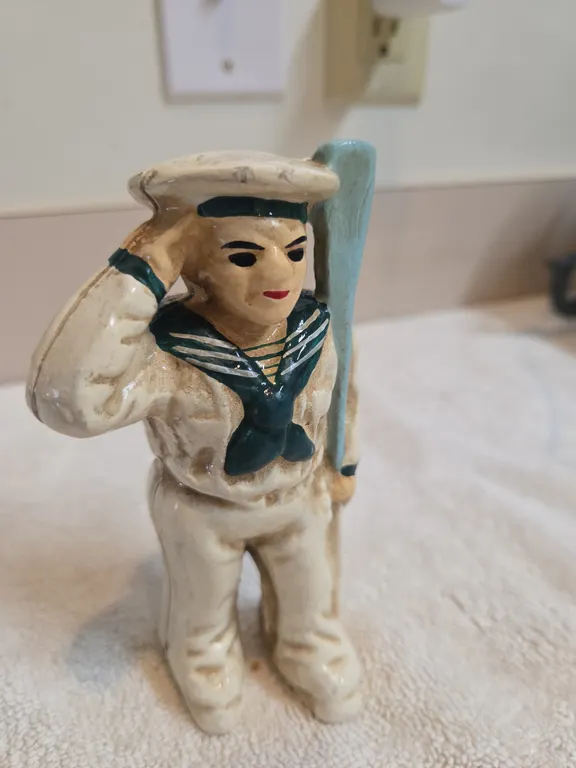 Vintage cast iron slootings sailor or oarsmen still coinbank
Thirty six dollars
