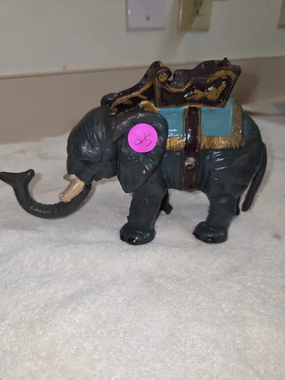 Cast iron circus, elephant mechanical coinbank, with painted blue saddle,