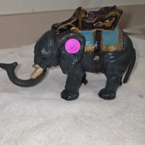 Cast iron circus, elephant mechanical coinbank, with painted blue saddle,