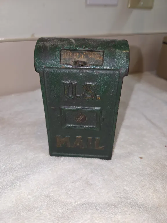 Vintage green cast iron u s mail coinbank