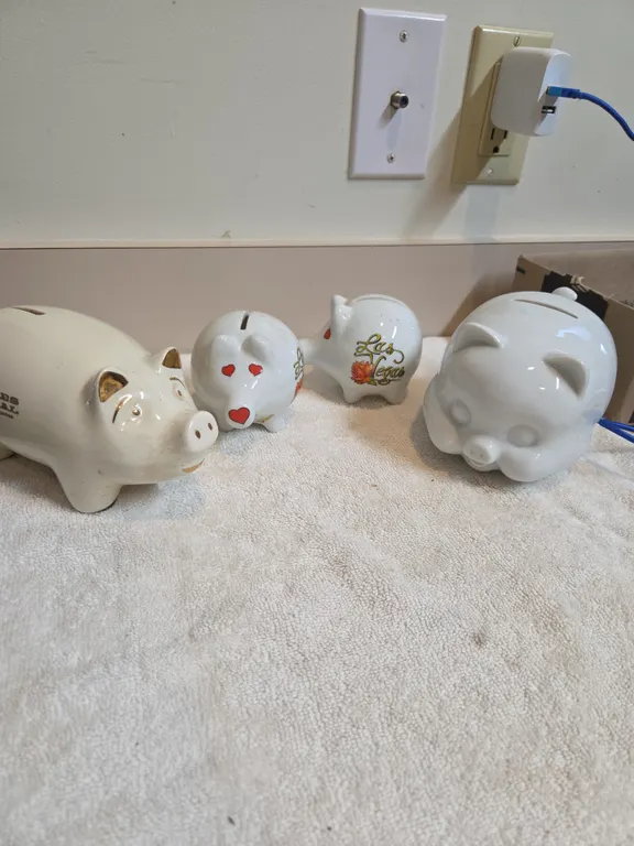 4 assorted ceramic piggy banks