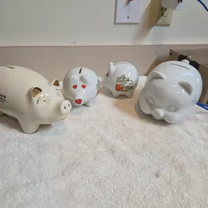 4 assorted ceramic piggy banks