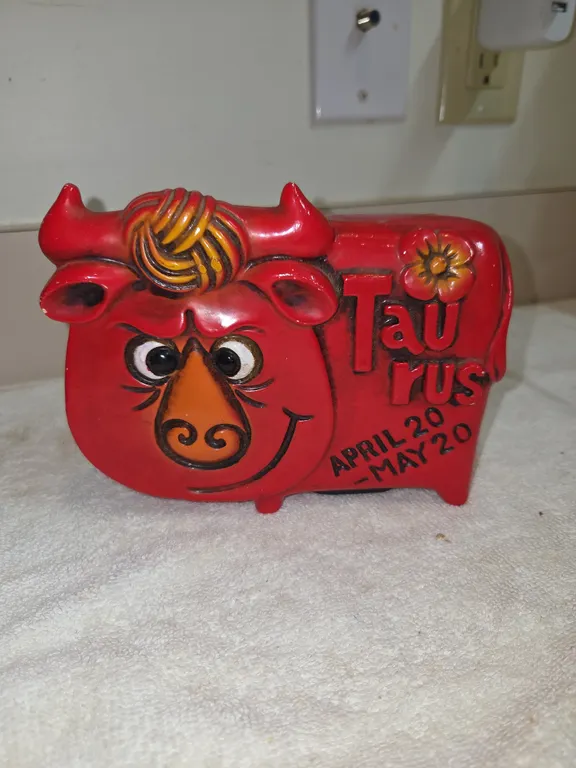 Vinted red ceramic Taurus zodiac coinbank from mid 20th century
