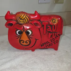 Vinted red ceramic Taurus zodiac coinbank from mid 20th century