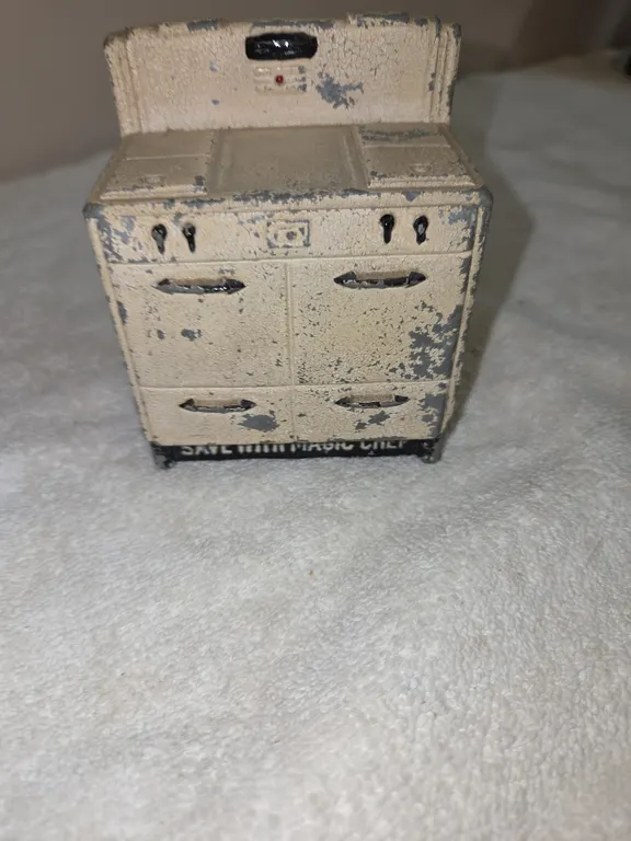 Vintage 1930s cast iron magic chef stove coinbank