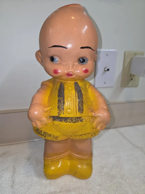 1940s chalkwear Kewpie doll coinbank.