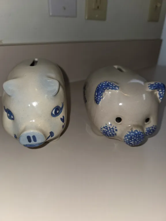 Two handmade ceramic piggy banks