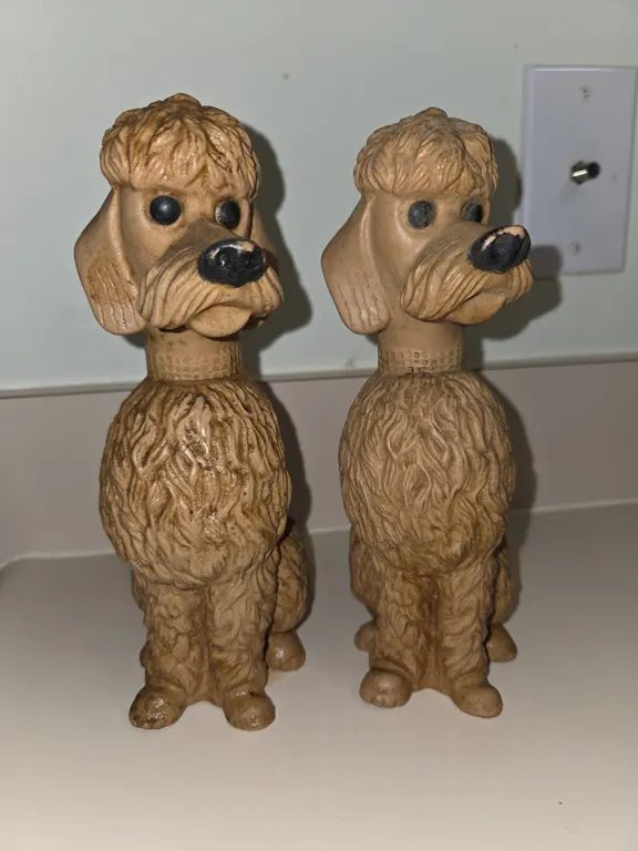 2 vintage plastic poodle, coin banks.