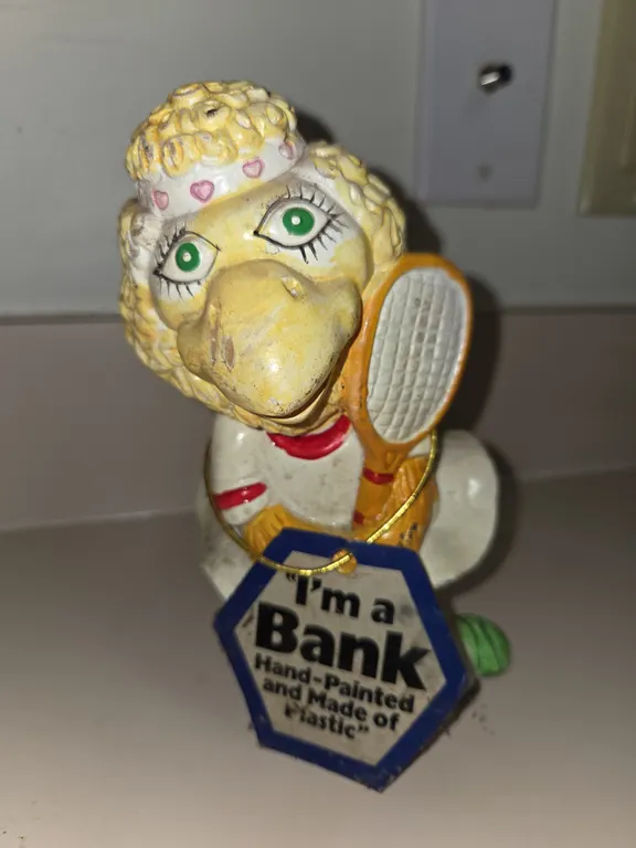 Vintage 1980s bird tennis player piggy bank