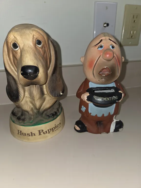 Plastic hush, puppy dog coinbank. Ceramic bald man coin bank with hat titled retirement fund.