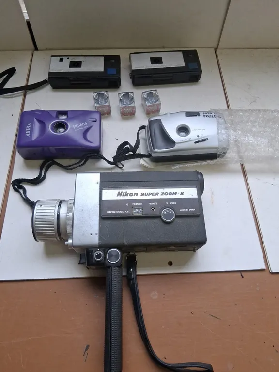 Vintage Nikon Super Zoom Hand held movie camera and others cameras