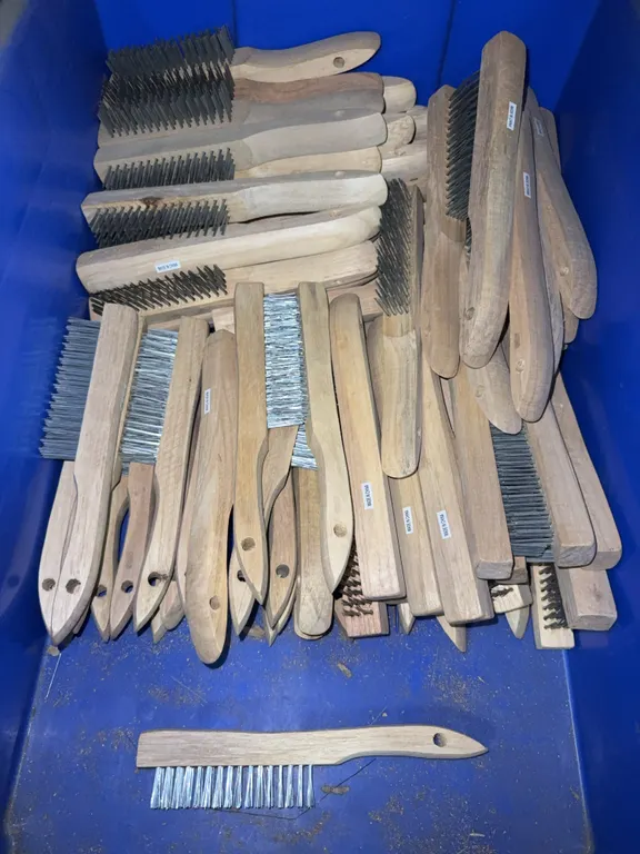 Bin of steel wire brushes