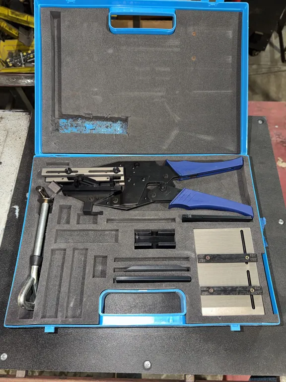 Amp-Latch Hand Tool