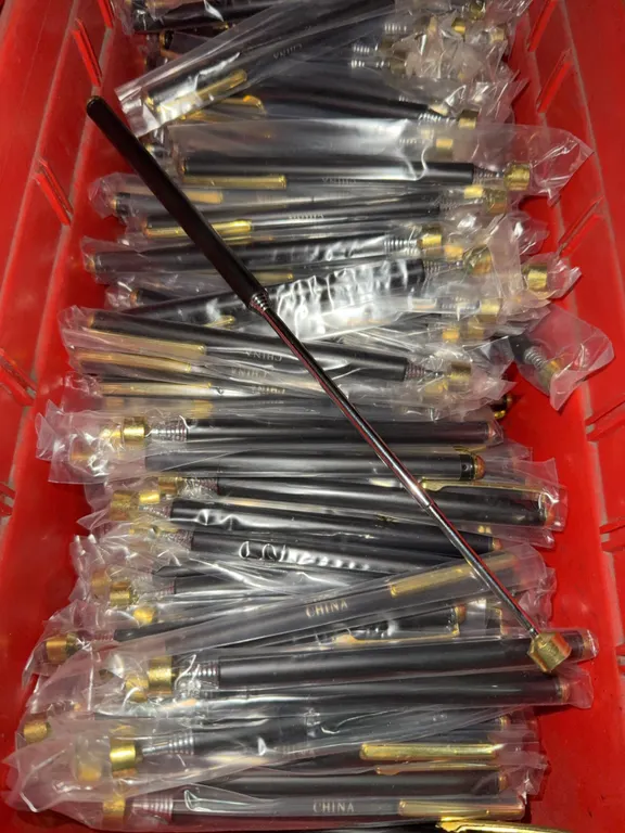 Bin of extendable, magnetic pens