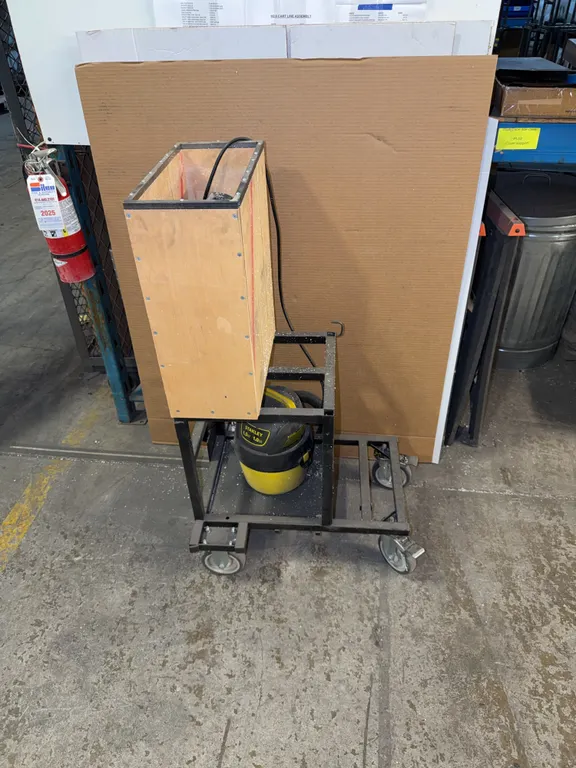 Rolling tool cart with sawzaw and shop vac