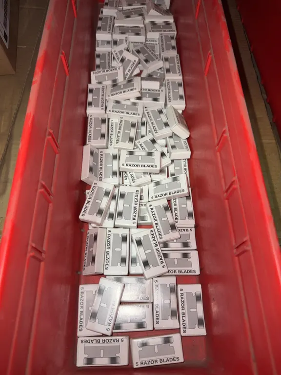 Bin of new in box razor blades