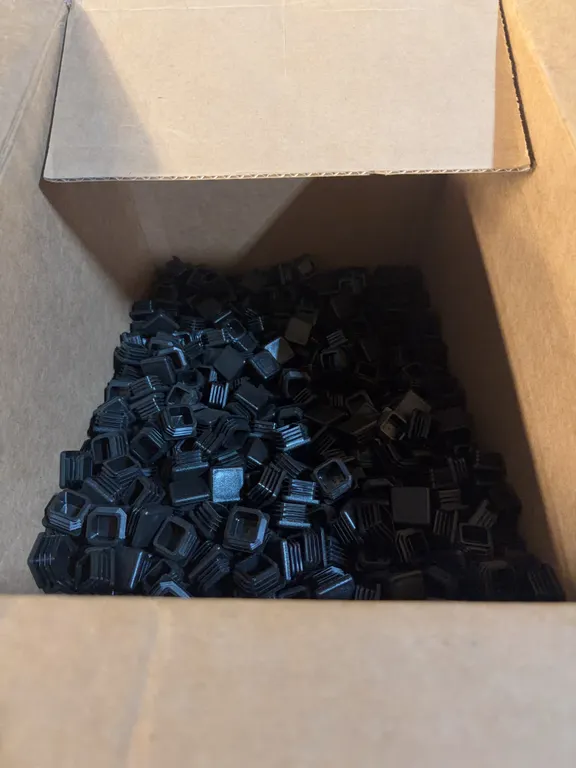 Box Of Black Square Caps