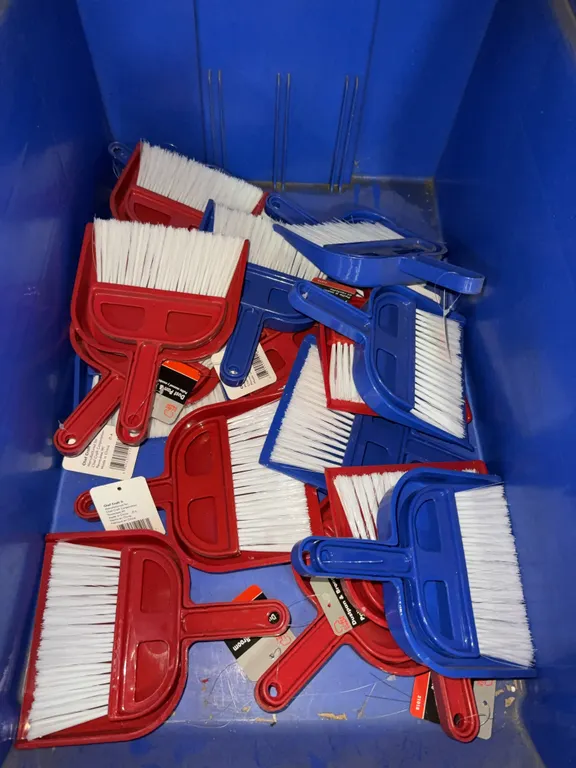 Bin of mini broom and dustpans