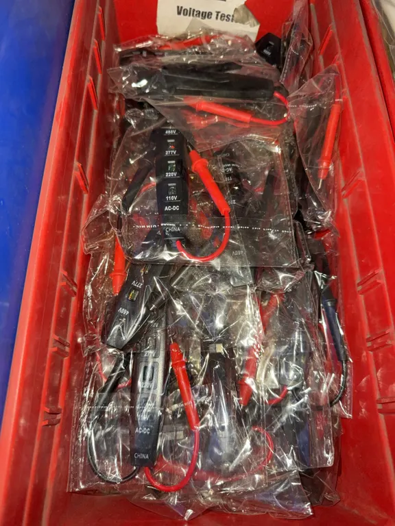 Bin of voltage testers