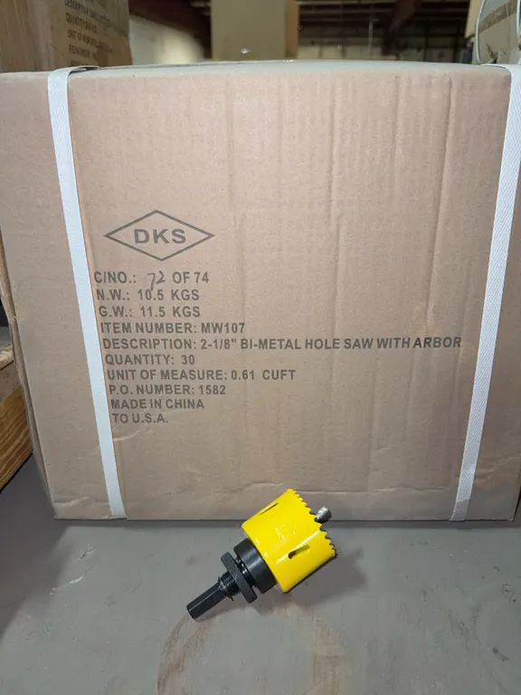 Box of 2 1/8” hole saw bits with arbor 30 per box