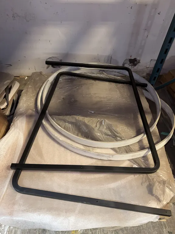 Pallet of metal brackets