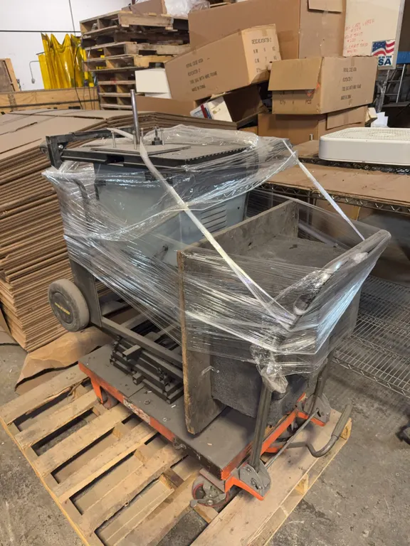 Pallet with rolling hydronic jacking cart and mobile shop routing table