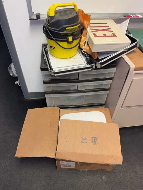 Miscellaneous organizer with computer equipment, and Velcro strapping
