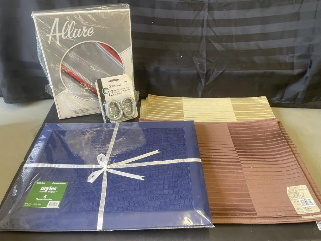 Three sets of four fabric placemats, and a new