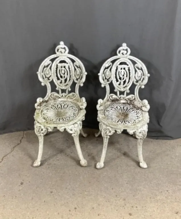 2 White Cast Chairs