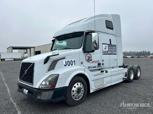 2015 Volvo VNL670 6x4 T/A Sleeper Truck Tractor