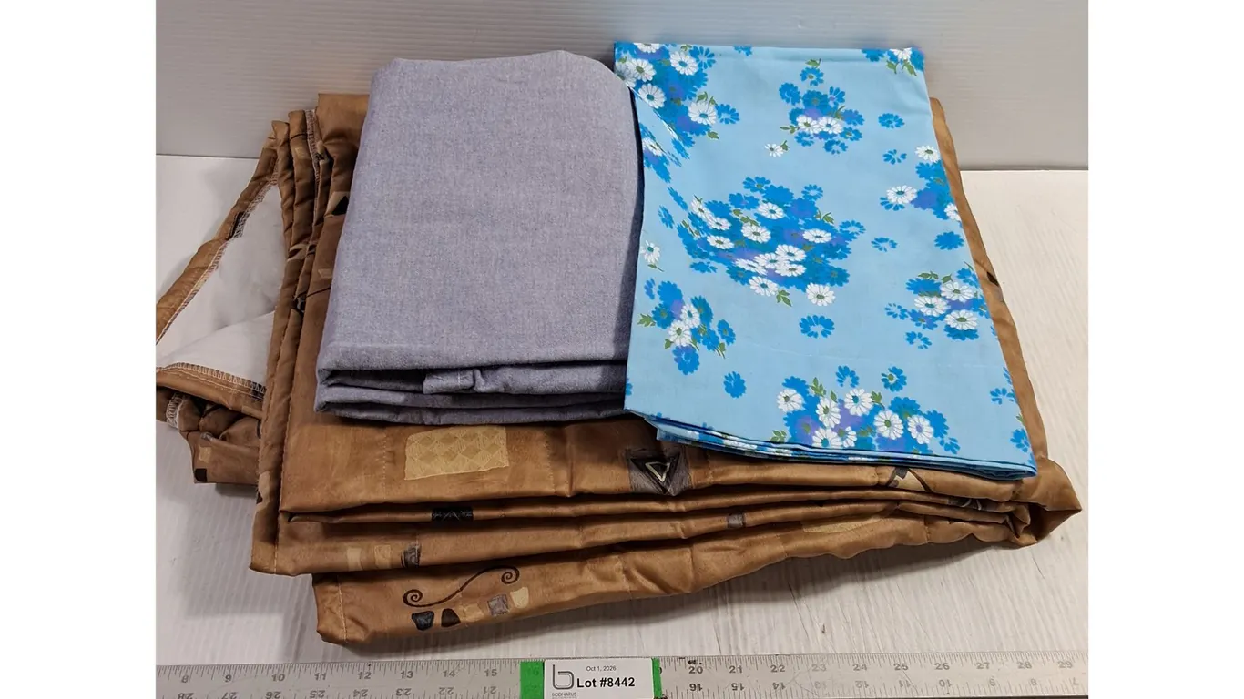 Blue Pillowcase,Light Grey Bed Sheet,Gold Comforter (unknown size)