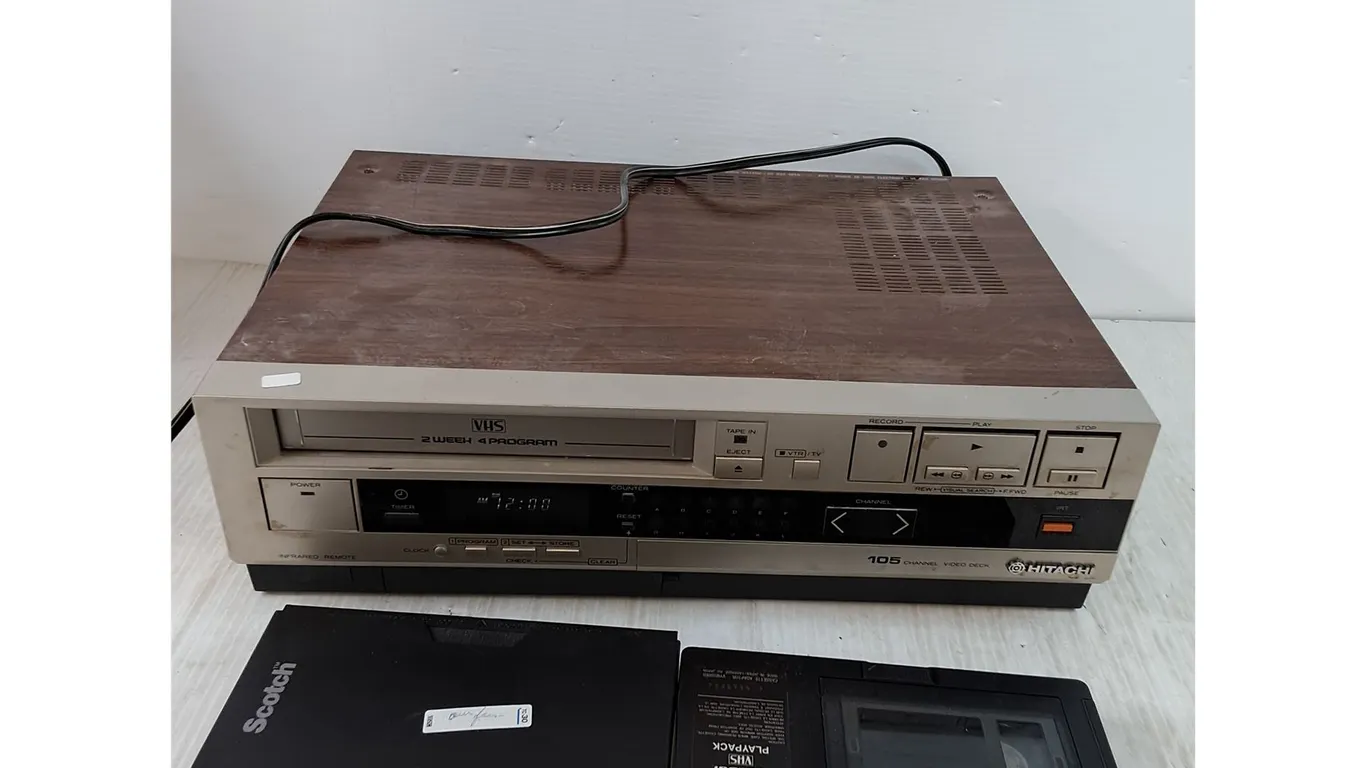 Hitachi VHS Player Powers On with (2) VCR Tapes and Manual