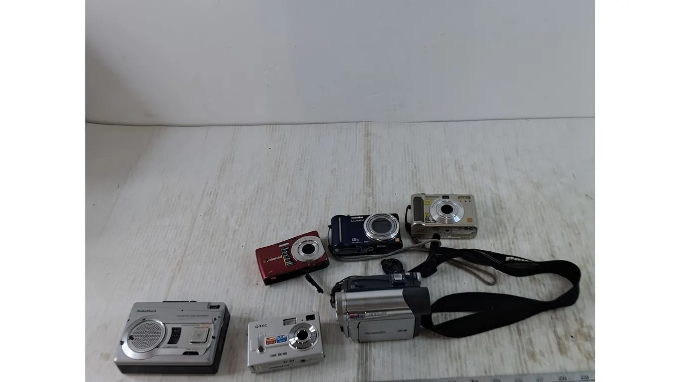(4) Camera, (1) Camcorder, (1) Cassette Recorder All Untested, Panasonic, Polaroid Misc All Untested