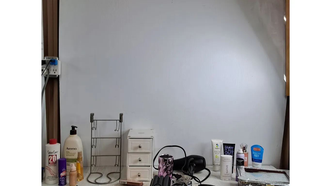 Various Makeup Supplies, Cell Phones, Hair Products (all as is)