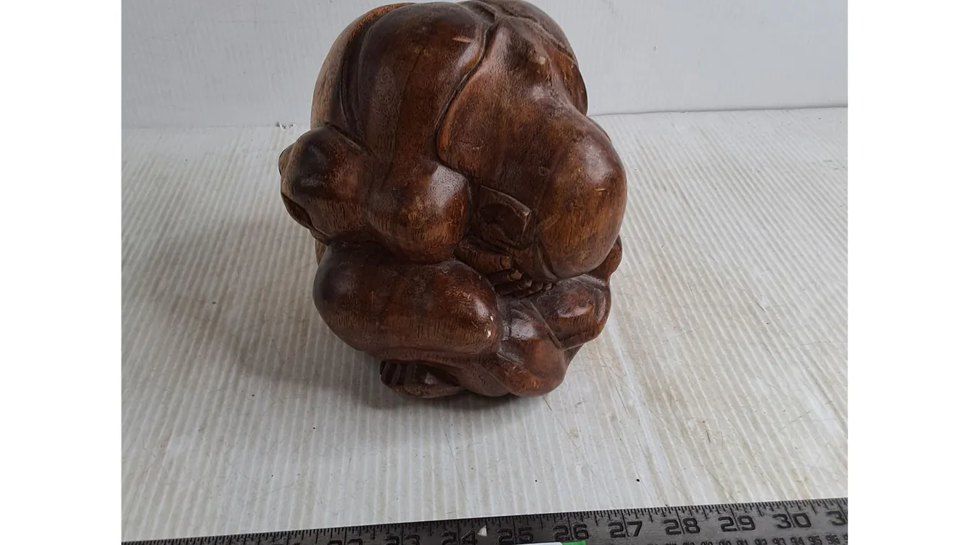 Wooden Sculpture of Sorrowful Man