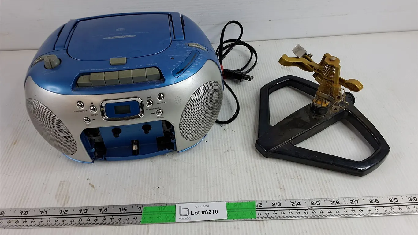 CD-R/Radio Player - Powers On, As Is, Garden Sprinkler