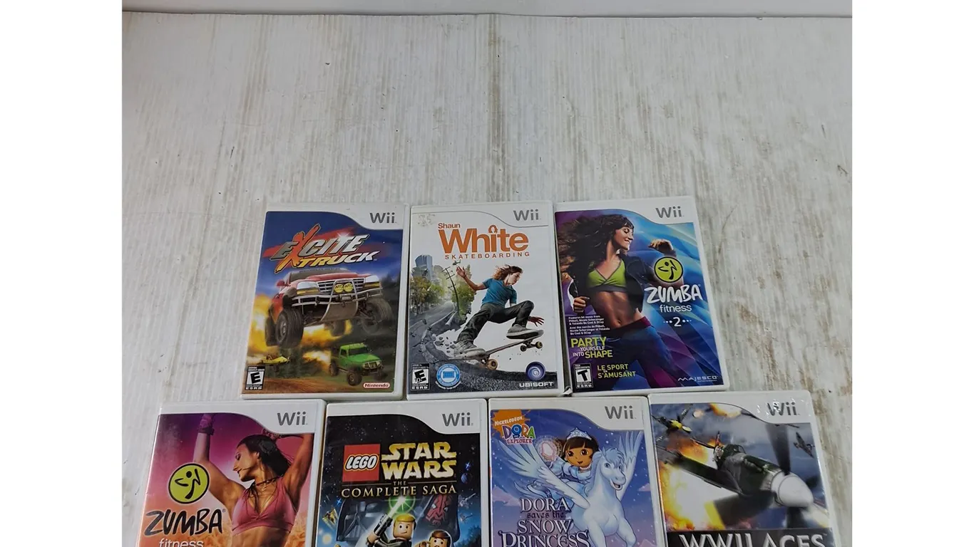 (7) Wii Games, Mumbai, Lego Star Wars, Dora, WWII Aces, Shaun White Skateboarding, Excite Truck