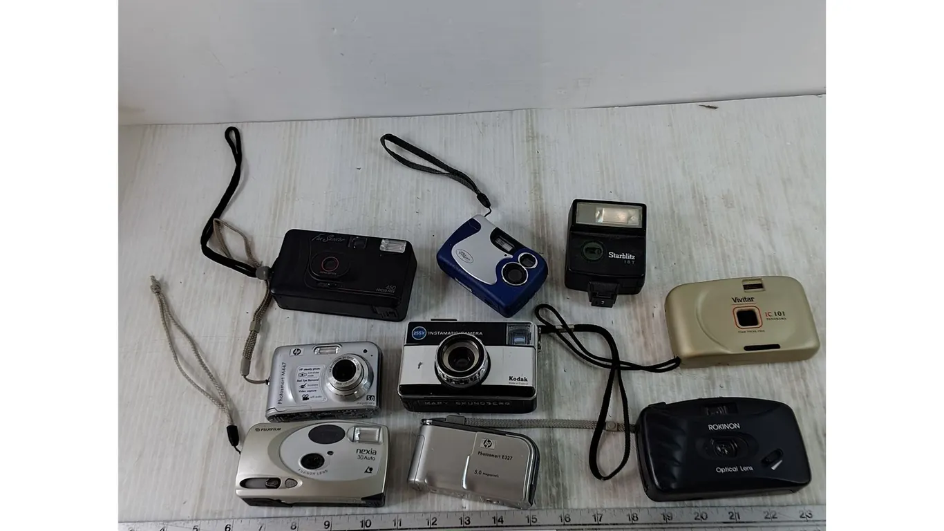 Assorted Cameras Untested and (1) Cameras Flash Attachment, HP, Kodak, Robinson, Vivitar, Fujifilm