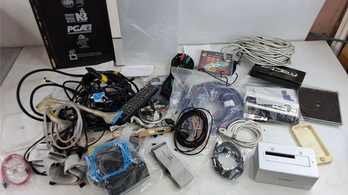 Assorted Computer Cables, SATA Hard Drive Dock, iPhone 4 Case, Remote, Misc