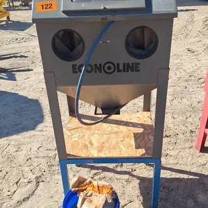 Econoline sand blaster with a pail of abrasive
