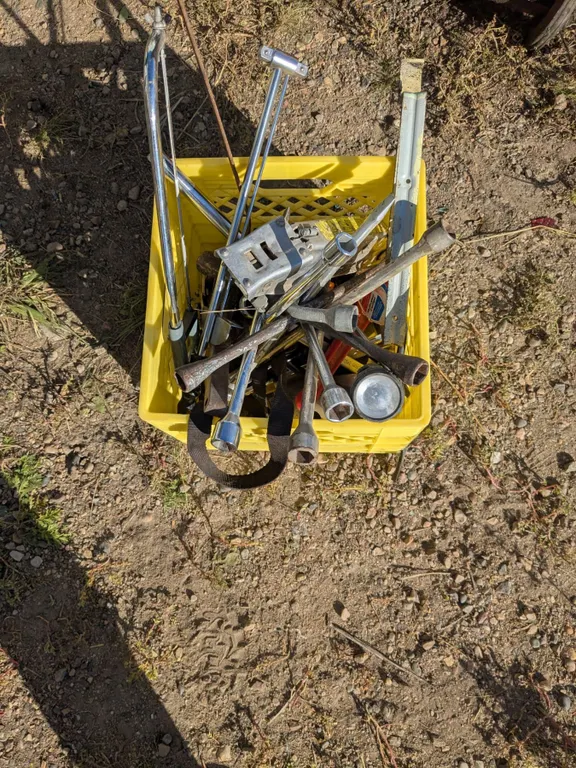 *OFFSITE* Milk Crate of Assorted Wheel Wrenches, Tools, etc.