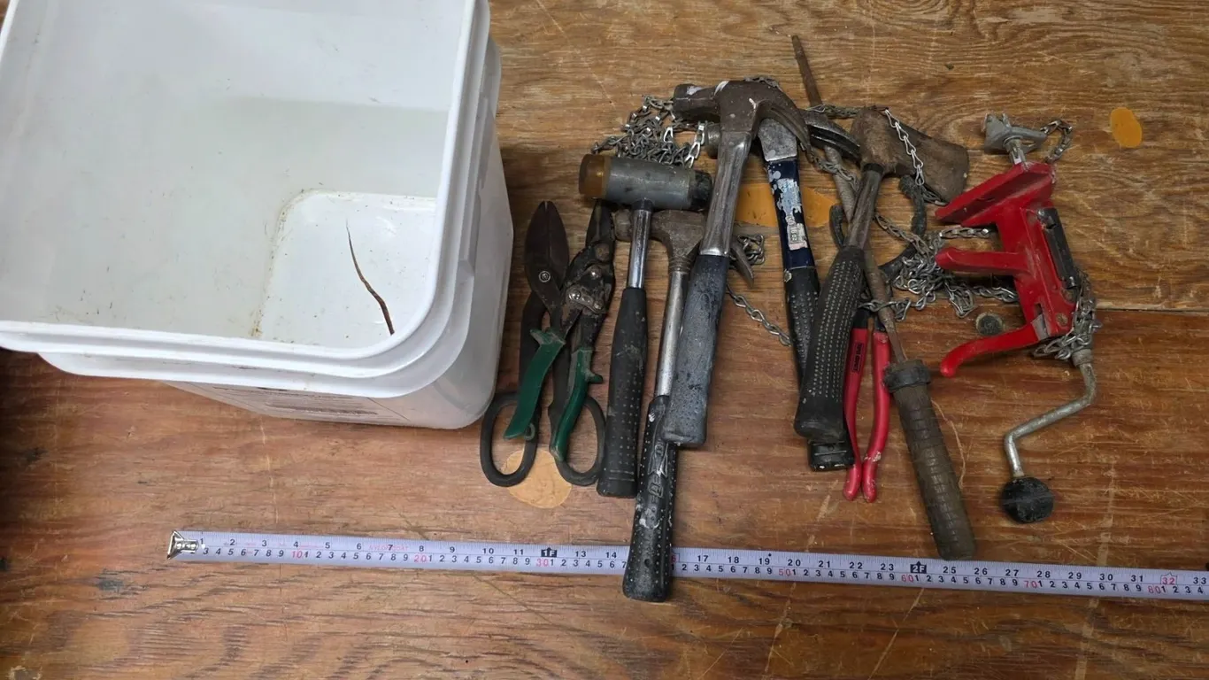 Bucket of misc tools- hammers, snips