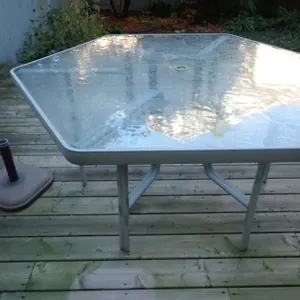 Glass-Top Patio Table With Umbrella Stand
