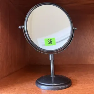Magnifying vanity mirror